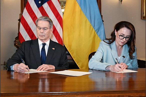 US Treasury Secretary Scott Bessent and Ukrainian First Deputy Prime Minister Yulia Svyrydenko sign the agreement to establish the United States-Ukraine Reconstruction Investment Fund. 