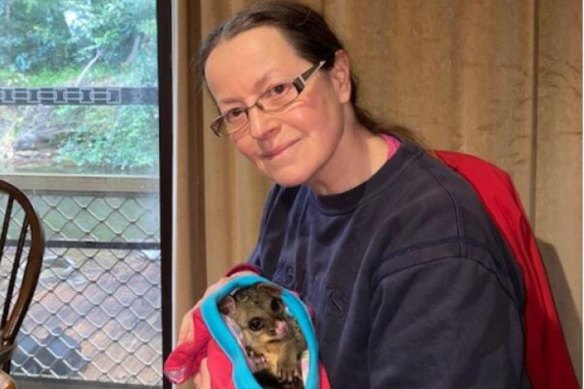 Judith Carter with a possum she cared for. Not one of the ones that was taken away.