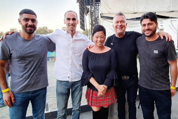 Farhad Bandesh (right) with friends Jamil Mirzaee and Moz Azimitabar, and Jane and Jimmy Barnes. The men attended a show at Rochford Winery at the personal invitation of the Barnes family.