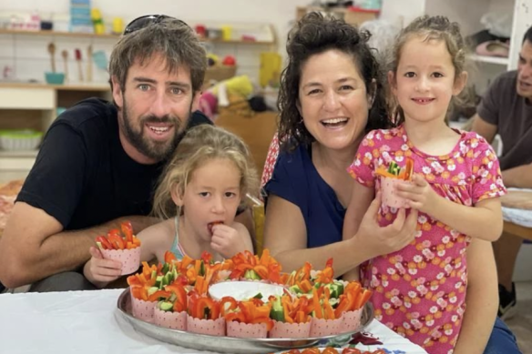 Tamar Kedem-Siman Tov with her husband Johny and 6-year-old daughters, Shahar and Arbel. 