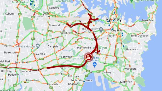 Traffic chaos as van fire shuts M8 Tunnel