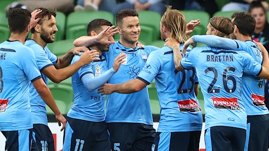 Sky's the limit: Sydney FC players celebrate after Adam Le Fondre put his side on the path to claiming bragging rights in the Big Blue at AAMI Park.