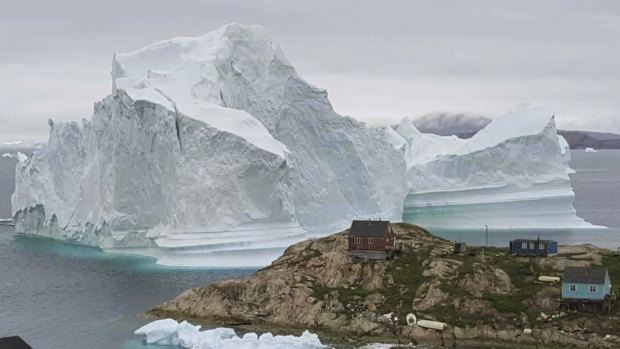 A massive iceberg caused the evacuation of the Greenland village of Innarsuit.