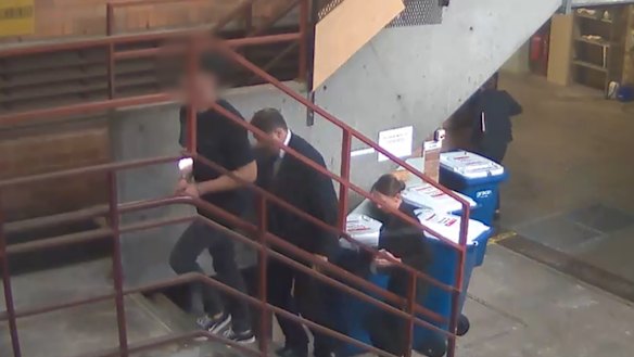 Beau Lamarre-Condon in police custody on Friday.