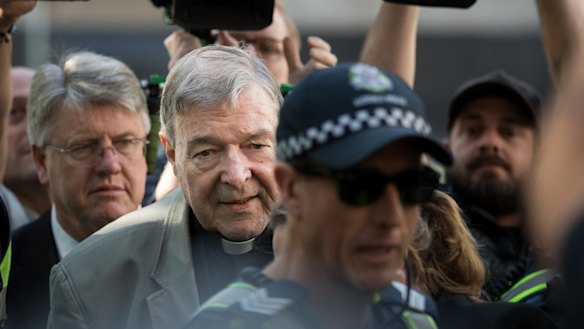 Cardinal George Pell arrives at the Melbourne County Court on Wednesday.