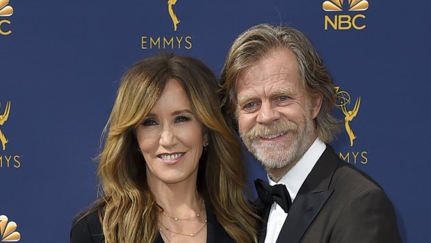 Felicity Huffman, left, and William H. Macy arrive at the 70th Primetime Emmy Awards in Los Angeles in September. 