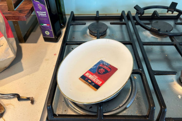 Police say this crime scene photo depicts a line of cocaine on a plate with an AFL football membership card in Grant’s name.