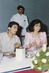 Zainab in a pink taffeta dress while in Iraq.