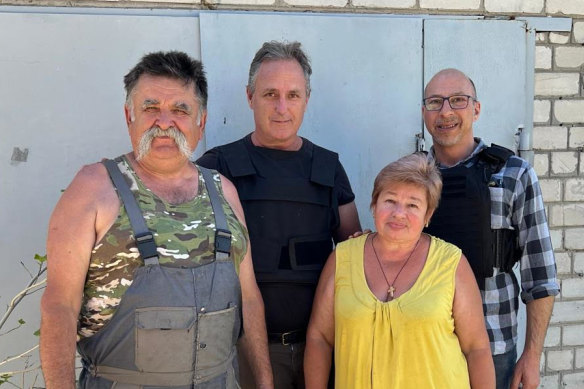 Locals Anton and Luba with James Baillieu (centre) and Ukrainian-Australian journalist Julian Krysh in Kupiansk on the front line.