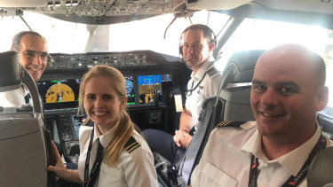 Pictured (L-R) Captain Michael King, Second Officer Shelley Kent, First Officer Ben Jenkins, First Officer Glen Oakey in the cockpit of Skippy, a Qantas 787 Dreamliner.