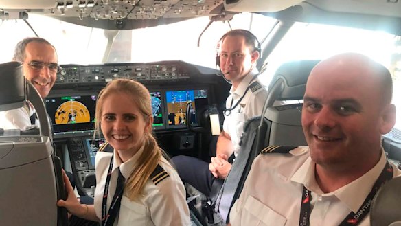 Pictured (L-R) Captain Michael King, Second Officer Shelley Kent, First Officer Ben Jenkins, First Officer Glen Oakey in the cockpit of Skippy, a Qantas 787 Dreamliner.