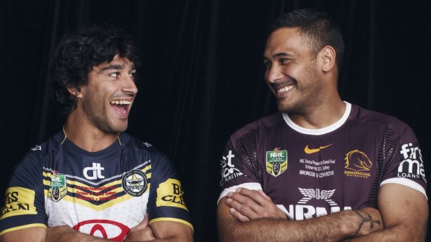 Johnathan Thurston (left) and Justin Hodges, captains of the Cowboys and Broncos respectively in the 2015 NRL grand final.