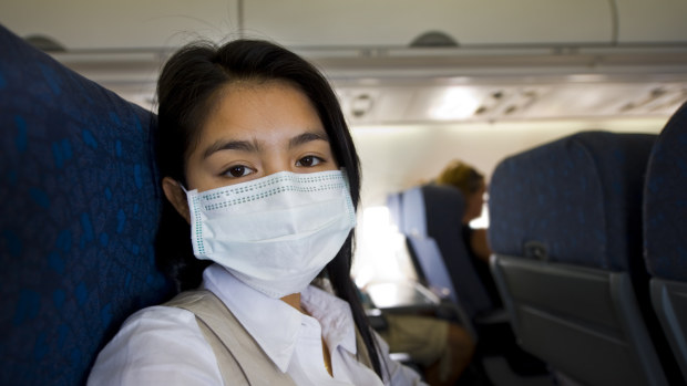 face mask on plane