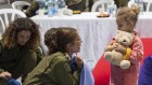 This handout photo provided by the Israel Prime Minister’s Office shows Yahel Shoham, three years old, upon her arrival in Israel after being freed. Yahel was one of the 13 Israeli hostages that Hamas released late on Saturday (Sunday AEDT).