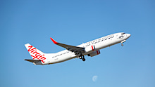 Virgin drops Economy X upgrades to as little as $8 per person. 