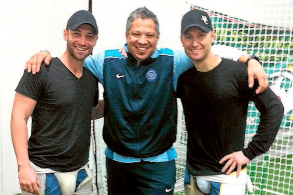 Neil D’Costa flanked by Phillip Hughes (left) and Michael Clarke.