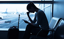 Stressed woman in the airport.