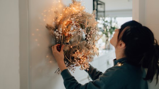 There’s a thrum in the air, a sense of anticipation in the streets. There are wreaths on the doors and inflatable Santas in the front yards.