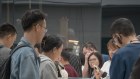 People check out Huawei’s new smartphone in Beijing. Ultimately, reflation hangs on revived consumer confidence.