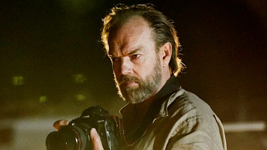 Hugo Weaving as a war photographer in Hearts and Bones. 