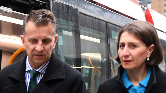 Transport Minister Andrew Constance and Premier Gladys Berejiklian inspect the first tram to reach Circular Quay, the northern end of a new light rail line from the CBD to Sydney's south east.