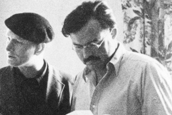 Bernard-Henri Lévy was inspired by Ernest Hemingway, right, photographed with American novelist John Dos Passos in Madrid during the Spanish Civil War.