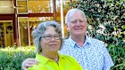 Living on their own terms: Henry Martin and Di Hetzel in the backyard with Henry’s ‘chapel’.