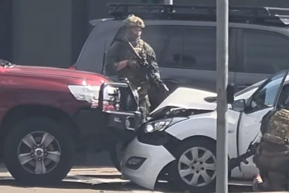 The white hatchback was stopped at the intersection of George and Campbell streets, Liverpool.