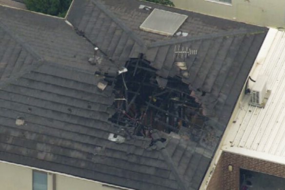 The woman and two girls were asleep in an upstairs bedroom.