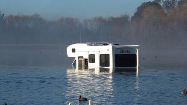 Stranded: The campervan shares Henley Lake with a handful of ducks.