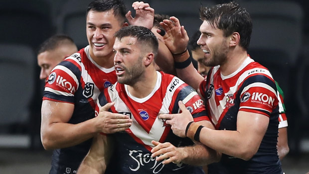 James Tedesco, centre, has been ruled out of the clash against the Broncos.