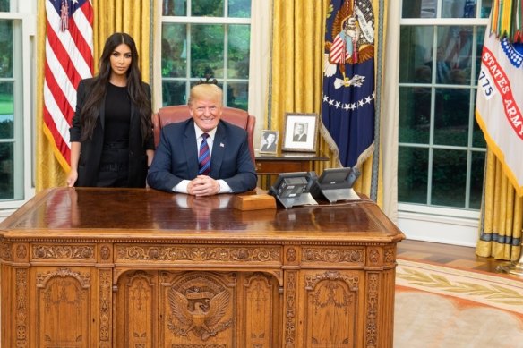 President Donald Trump with Kim Kardashian in the Oval Office in 2018.