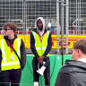 A screengrab of a video uploaded to TikTok allegedly showing men posing as security guards at the Grand Prix