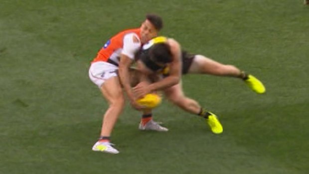 Concussed: The hit by Trent Cotchin that ended Dylan Shiel's preliminary final.