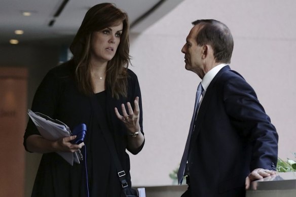 Peta Credlin and Tony Abbott on the campaign trail in 2013.