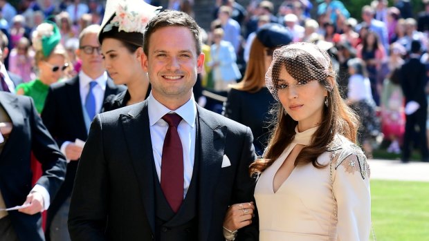 Markle's Suits co-star Patrick J. Adams with his wife Troian Bellisario at the royal wedding in May last year.