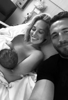 Phoebe and Sam Burgess with their son, who was born in early December.