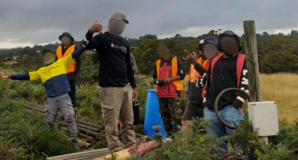 One worker (centre-front) said he and his workmates had to resort to fishing to feed themselves.