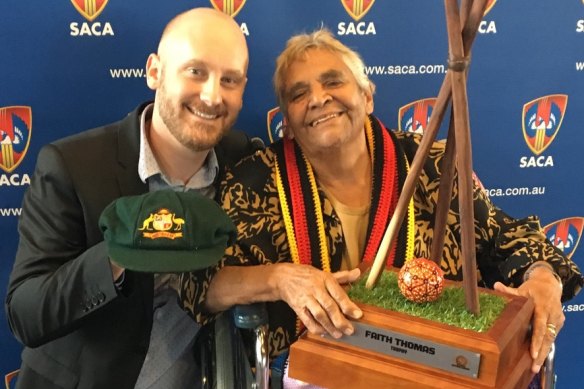 Cricket trailblazer Aunty Faith Thomas (right) has died at the age of 90.