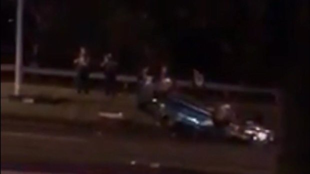 The Holden sedan landed on it's roof after losing control on the Prince's Highway. 