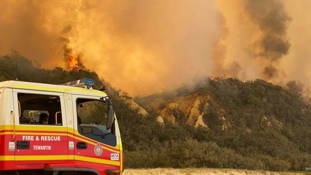 A picture taken by firefighters on Fraser Island last week showing the roaring flames.