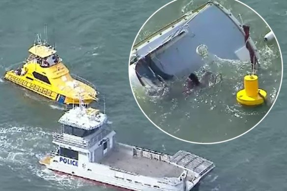 Three men have died after their boat capsized in waters off Brisbane on Boxing Day. 