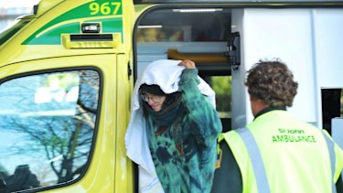 Dion Reynolds with St John after he was found alive with his bushwalking partner Jessica O'Connor.