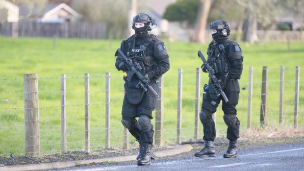 NZ Armed Offenders Squad members near the scene.