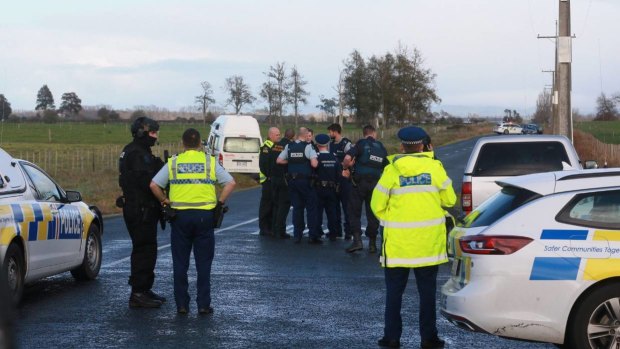 NZ police around the campervan.