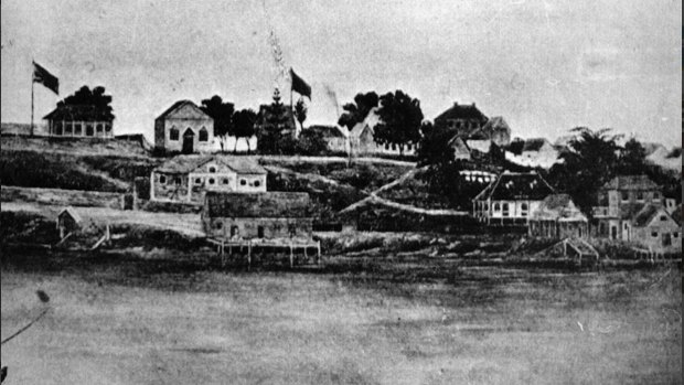 Brisbane's Queen's Wharf Road and the wharf in the 1860s. Some of the city's earliest pubs, The Green Man and the Queens Head Inn feature.