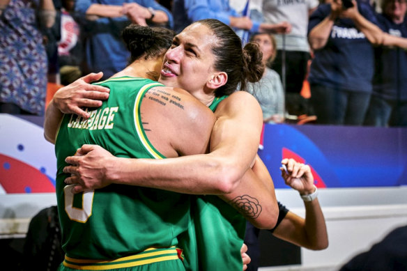 Australian Opals Liz Cambage and Marianna Tolo celebrate qualifying for Tokyo.