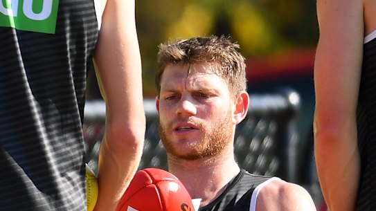 Collingwood sponsor CGU Insurance will redirect $1 million to promote race relations.