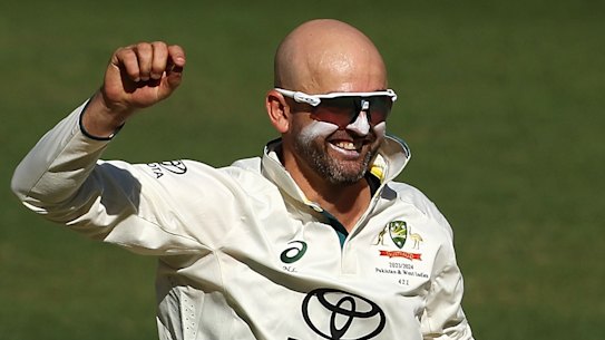 Nathan Lyon celebrates his 500th Test wicket on Sunday.