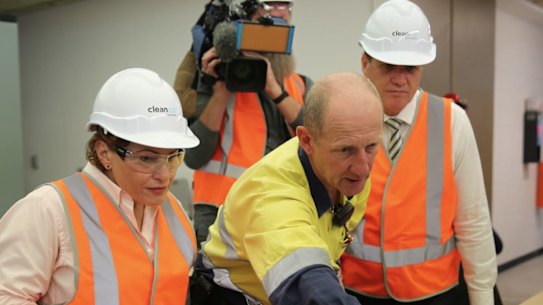 Energy Minister Dr Anthony Lynham and Treasurer Jackie Trad inside CleanCo's hydro electricity plant at Wivenhoe Dam.